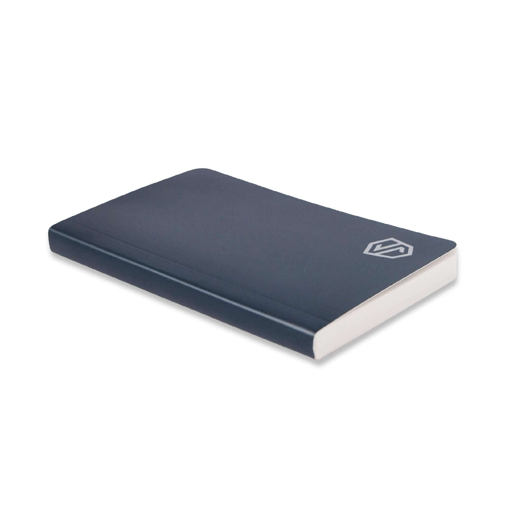 A Stonebook ™ Notebook lying on a white background at an angle